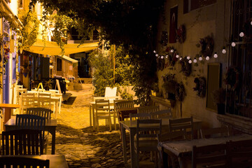 Night view of historical, old street in old town of Cunda (Alibey) island.