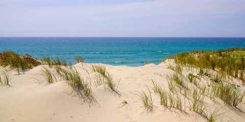 sandy natural beach with dunes of Le Porge near Lacanau in France