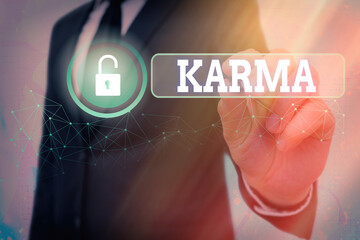 Text sign showing Karma. Business photo showcasing sum of an individual actions in this and...