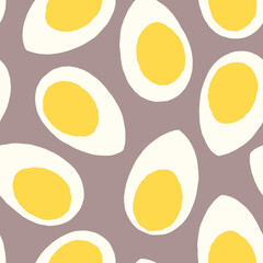 Hand painted seamless pattern with eggs in yellow and white on brown background.