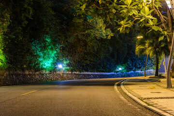 Beautiful night multi-colored illumination in Luhuitou Park, Sanya, island Hainan, China