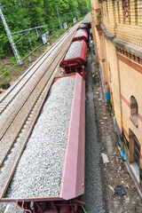 Cargo train with aggregate stones, view from above