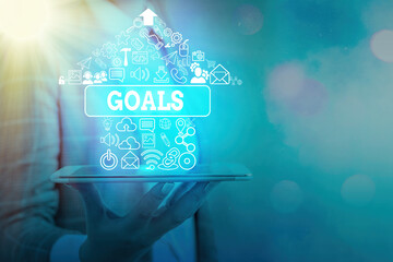 Text sign showing Goals. Business photo text desired result that an individual envision plan and...