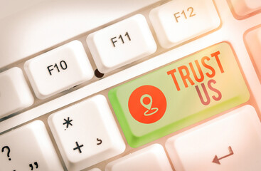 Handwriting text writing Trust Us. Conceptual photo believing in the integrity and honesty of a...
