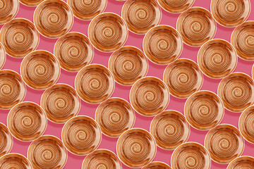 Background from orange round ceramic plate with spiral pattern