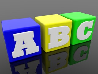 ABC concept on colored toy blocks on a black background