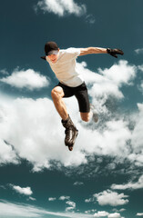 Aggressive inline skating. Young athlete performs tricks during freestyle rolling.