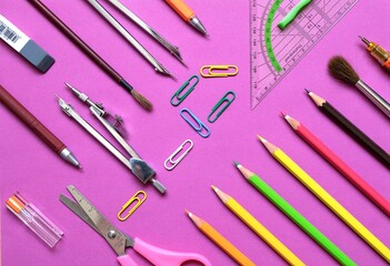 Flat composition of School stationery on a colorful background. The view from the top.