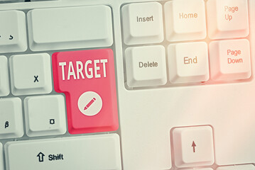Conceptual hand writing showing Target. Concept meaning something at which someone is aiming a...