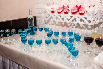 Wedding buffet. Blue alcoholic cocktail