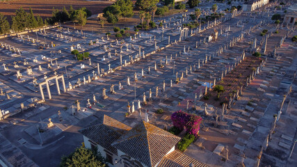 Aerial view of a cementery with cross sculptures