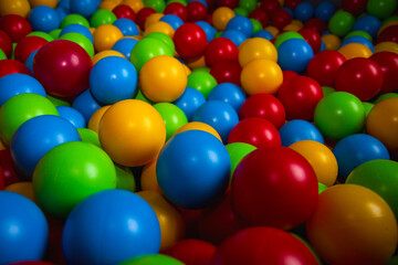 Children's playpen colorful balls. Top down view.