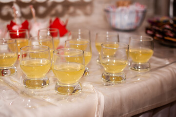 Wedding buffet. Yellow alcoholic cocktail