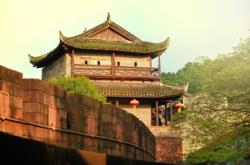 North Gate Tower and Tuojiang River in Fenghuang, Hunan Province, China.
