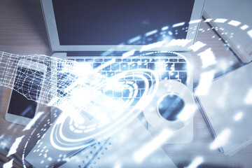 Multi exposure of data theme drawing hologram over topview work desk background with computer. Concept of technology.