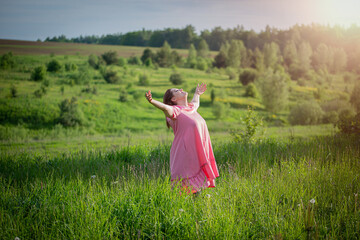 the girl with outstretched arms