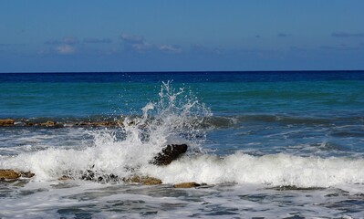 Crashing waves, shooting spray