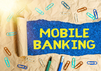Conceptual hand writing showing Mobile Banking. Concept meaning to create financial transactions...