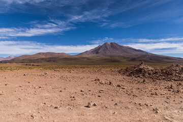 Volcano in the desert with blue sky