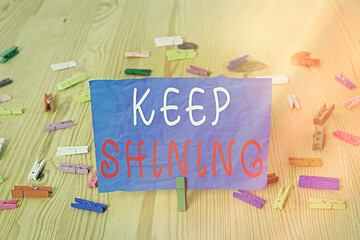 Writing note showing Keep Shining. Business concept for being a good demonstrating excelling on a...