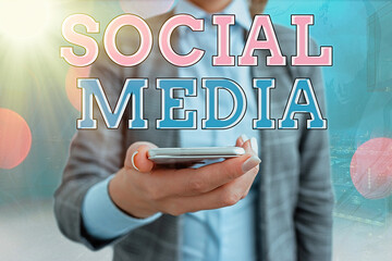 Conceptual hand writing showing Social Media. Concept meaning online marketing and having fun...