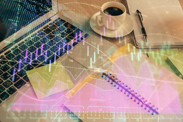 Multi exposure of forex graph drawing and desktop with coffee and items on table background. Concept of financial market trading