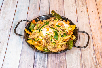 Plate of broken eggs in the Spanish style