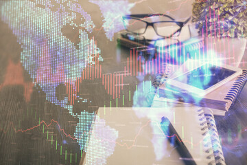 Double exposure of forex chart drawing and cell phone background. Concept of financial trading