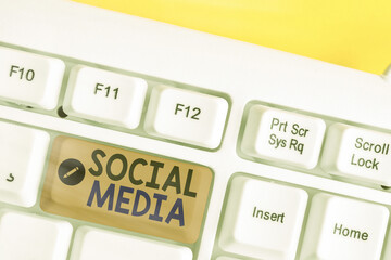 Conceptual hand writing showing Social Media. Concept meaning online marketing and having fun...