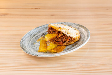 Colombian toast on wooden table