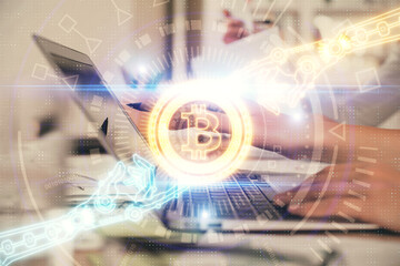 Double exposure of woman hands typing on computer and crypto market theme hologram drawing. Blockchain concept.