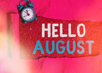 Conceptual hand writing showing Hello August. Concept meaning a positive greeting for the month of summertime season