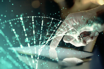 Double exposure of man's hands holding and using a phone and DNA drawing. Medical education concept.