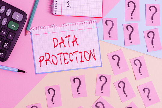 Writing note showing Data Protection. Business concept for safeguarding information away from a possible data breach Mathematics stuff and writing equipment above pastel colours background - Powered by Adobe
