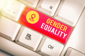Writing note showing Gender Equality. Business concept for access to same privilege given to both...