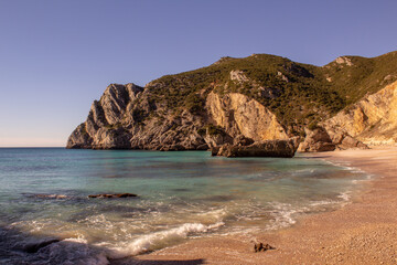 Ribeira do Cavalo is a paradise beach with crystal clear blue waters in the town of sesimbra , Portugal