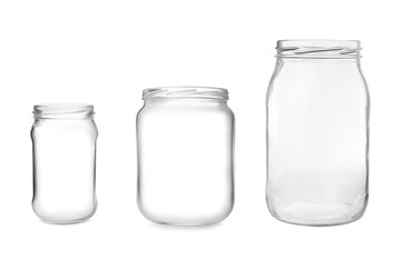 Set with open empty glass jars on white background