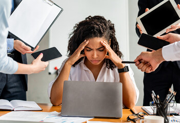 Overworked Business Lady Sitting Stressed In Modern Office