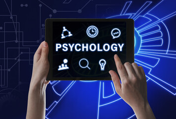 Psychologist working with modern tablet on color background, closeup