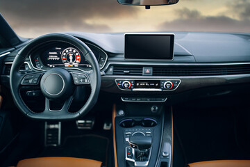 Obraz na płótnie Canvas Modern car interior with leather panel, multimedia and dashboard