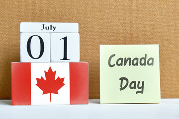 1st july canada Day first of month calendar concept on wooden blocks.
