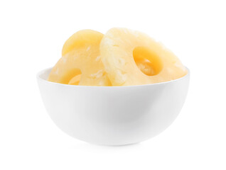 Delicious canned pineapple rings in bowl on white background