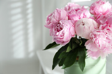 Bouquet of beautiful pink peonies indoors, closeup. Space for text
