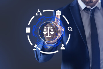 Lawyer touching virtual screen against dark background, closeup