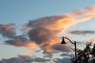 streetlamp silhouetted at sunset