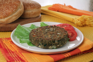 Lentil burger with onion and herbs