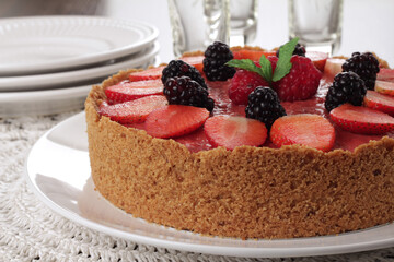 red fruit cheesecake with mint leaf