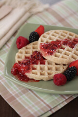 waffle with red fruit jam