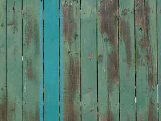 Vertical old rustic fence blue and green