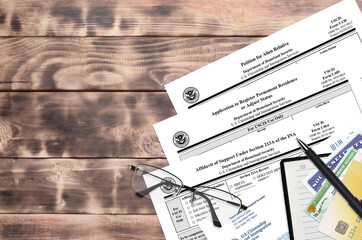 I-130 Petition for alien relative, I-485 Application to register permanent residence or adjust...